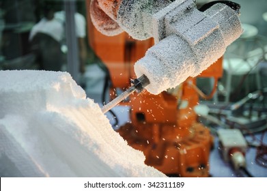 Cutting Polystyrene Foam Machine In  Factory, Workers Hands Angle Grinder Tool