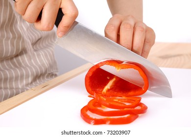 cutting red pepper