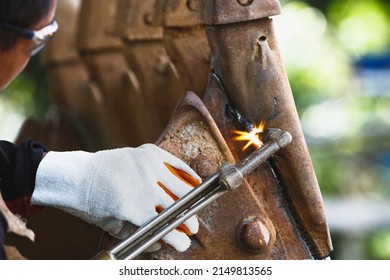 Cutting A Steel With A Gas Torch.  Gas Welding And Oxy-fuel Cutting Are Processes That Use Fuel Gases And Oxygen To Weld And Cut Metals.