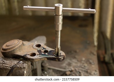 Cutting A Thread In A Hole With A Tap By Hand. Material High Speed Steel. We Make An Internal Thread.