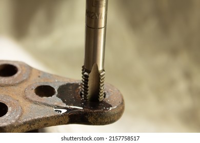 Cutting A Thread In A Hole With A Tap By Hand. Material High Speed Steel. We Make An Internal Thread.