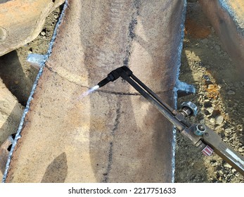 Cutting Torch Next To Cut Metal