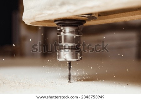Cutting wood using a machine with numerical control. Cnc tool.