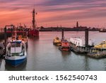 Cuxhaven harbor in Germany at the North Sea. View of boats moored in harbor.