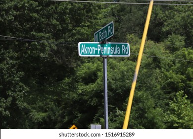 Cuyahoga Falls, OH/United States - 07/21/2019: The Street Sign At W. Bath Road And Akron Peninsula Road