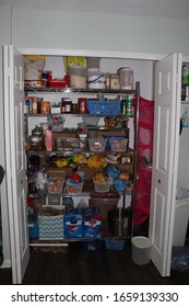 Cuyahoga Falls, OH/USA - 02 28 2020:overview Of Open Pantry That Is Stuff And Messy