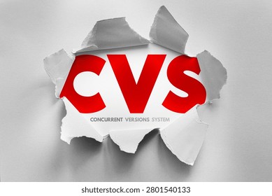 CVS Concurrent Versions System text revealed through torn paper representing version control, source management, collaboration, code history, software development workflow, repository tracking