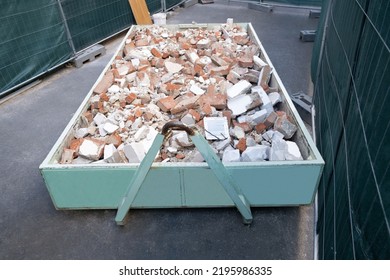 Cyan Metal Dumpsters Container Full Of Construction Garbage, House Renovation..