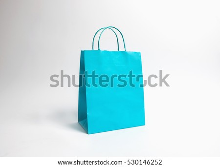 Cyan paper bags isolated on white background
