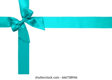 Cyan Ribbon With Gift Satin Bow On White Background