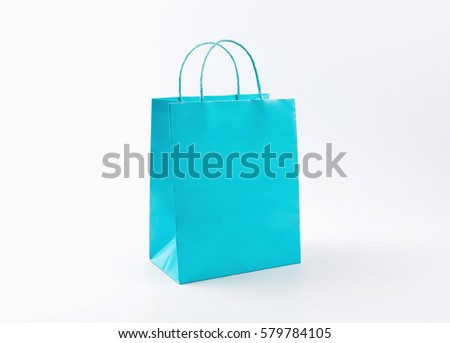 Cyan shopping bag on white background.