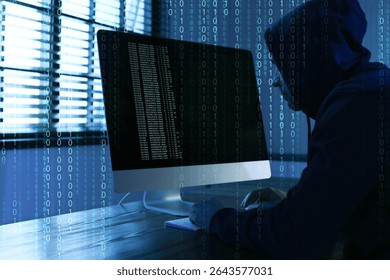 Cyber attack. Hacker working on computer at table in dark room. Binary code around him