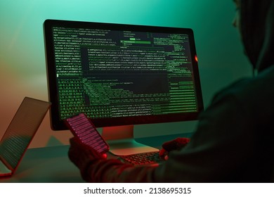 Cyber attack. Hackers breaking security. Anonymous people access secret data. Cyber war. Anonymous people using computer and programming to break code. Access to private data. Cyber security threat