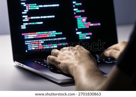 Cyber attack or malware hacker. Cyberattack to computer data. Cybersecurity. Ransomware code. Security software against spyware. Fraud, virus or breach threat. Man and laptop.