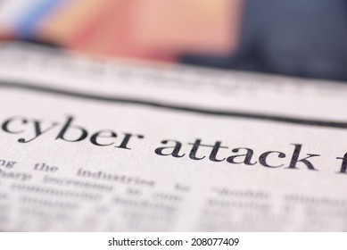 Cyber attack written newspaper. Cyber attack written newspaper, shallow dof, real newspaper. 