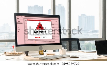 Cyber attacking concept. Malware alert showing on computer screen display scam and threat detection on computer system or online server to be removed snugly.