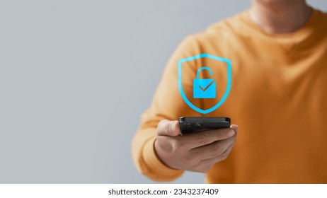 Cyber ​​security and data protection, businessman using smartphone internet network security, protect business and financial transaction data from cyber attack, user private data security encryption.