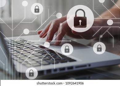 Cyber internet security concept. GDPR and cybersecurity. Protection of private personal data. A person using internet on laptop on the background. - Shutterstock ID 1092641906