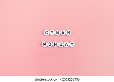 Cyber monday lettering on pink background. Online shopping concept on the internet.