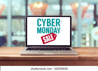 Cyber Monday sign on laptop computer. Holiday online shopping concept. View from above
