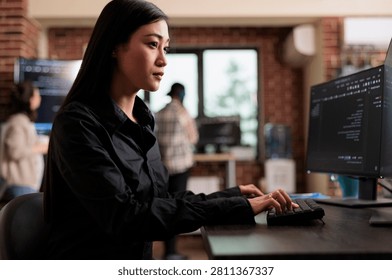 Cyber officer encrypts large data files to protect company information with autonomous defense and artificial intelligence technology.