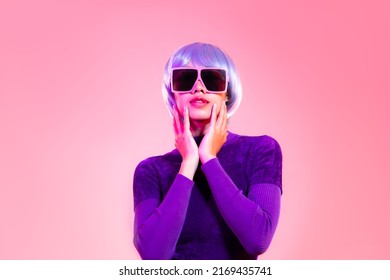 Cyber Punk Girl Concept, Asian Woman In Purple Sweatshirt Silver And Blue Short Hair Style Wearing Sunglasses Posing Like Robot. 