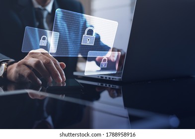 Cyber Security, Business, Technology, Internet Network, Software Development, Digital Data Protection Concept. Businessman Working On Laptop Computer In Office With Pop Up Antivirus System