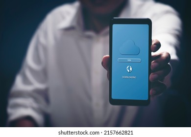 Cyber security Cloud computing  Concept , Business technology global network ,Data protection information internet access , Businessman  downloading  application cloud computing to smartphone