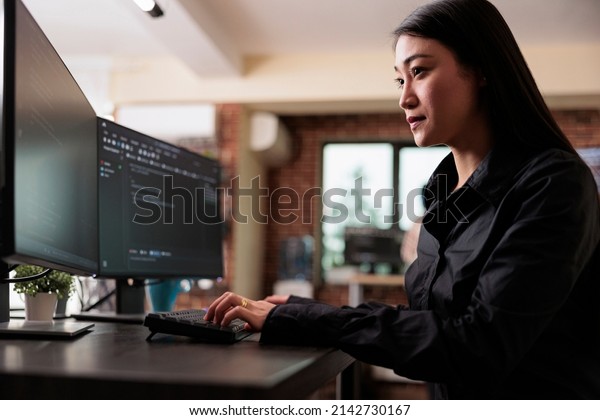 Cyber\
security company employee developing blockchain based database\
processing system. Cybernetic officer coding a machine learning\
software to protect mainframe encrypted\
files.