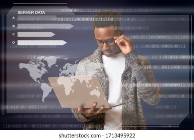 Cyber Security Concept. African american man in glasses using laptop, hacking database server, blue world background
