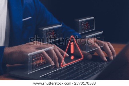 Cyber security concept. data breach man using computer with system hacked alert due to cyberattack on computer network. Triangle caution warning sign alarm for error and maintenance notification.