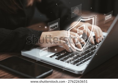 Cyber security concept with digital shield and lock icons on laptop, representing data protection, privacy security, secure network, online safety and information protection technology.