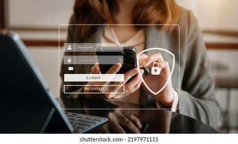 Cyber Security Concept, Login, User, Identification Information Security And Encryption, Secure Access To User's Personal Information Woman Using Smart Phone And Tablet In Modern Office
