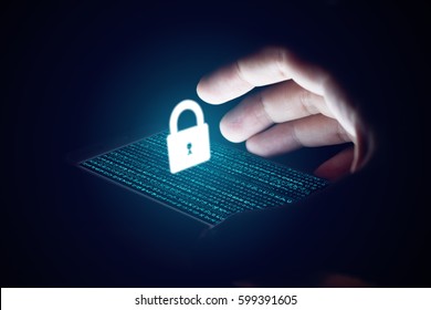 Cyber security concept, man hand protection network with lock icon and virtual screens on smartphone. - Shutterstock ID 599391605