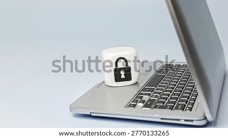 Cyber Security Concept with Padlock Icon on Laptop Keyboard Representing Data Protection Privacy Safety Encryption and Network Policy. 