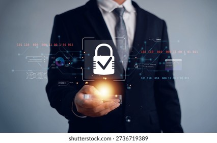 Cyber security and data protection concept with secure lock icon and digital interface in businessman hand, representing information security, privacy, secure access, enterprise technology systems.