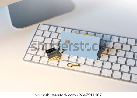 Cyber security and data protection concept. Debit card is locked on locker. Key, lock, keyboard, computer.