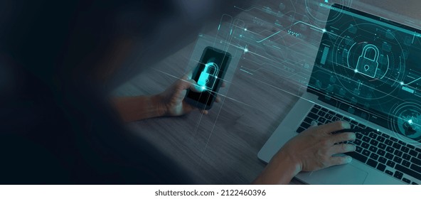 Cyber security and data protection information privacy internet technology concept.Businessman working on smartphone modern computer show padlock protecting business with virtual network connection. - Powered by Shutterstock