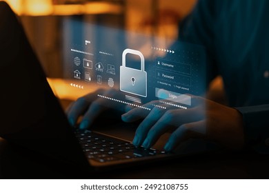 Cyber ​​network security and data protection on the internet, businessman using laptop security encryption with padlock icon Protect your business and financial information from cyberattacks.