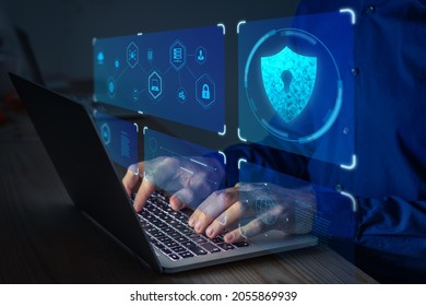 Cyber security expert working on network and data protection on laptop computer against digital crime. Privacy technology on internet.