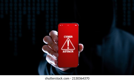 Cyber security hacker smartphone. Internet web hack technology. Digital mobile phone in hacker man hand isolated on black banner. Data protection, secured internet access, cybersecurity