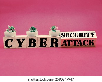 "Cyber security" instead of "Cyber attack" written over turned wooden cubes 