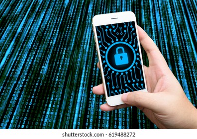 Cyber security network concept. Hand using smartphone with master key connect world networking virtual graphic and binary coded background. - Powered by Shutterstock - Get 15% off with code: PIKWIZARD15