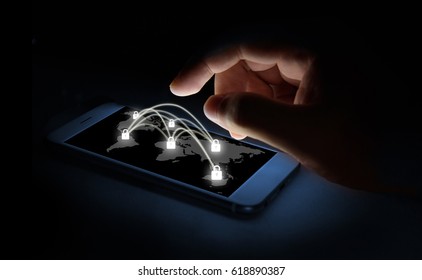 Cyber security network concept. Man Finger using smartphone with master key connect world networking virtual and world map graphic
