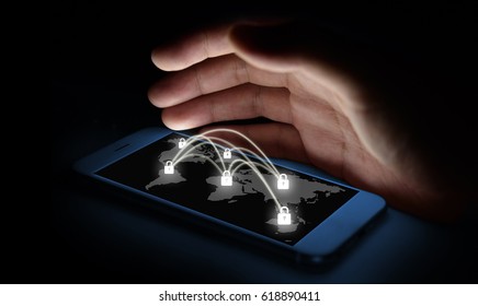 Cyber security network concept. Man Finger using smartphone with master key connect world networking virtual and world map graphic