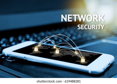 Cyber security network concept. Smartphone with master key connect world networking virtual and world map graphic. Flare light effect.