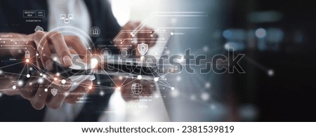 Cyber security network. Data protection concept. Businessman using laptop computer with biometric identification on internet technology network with cloud computing and data management, cybersecurity