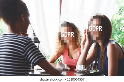 Cyber Security And Privacy. Group Of Women In Cafe, Faces Hidden Behind GDPR Inscription