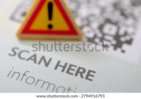 Cyber Security Scam Alert with Warning Sign Over QR Code to Scan Here