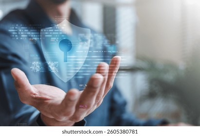 Cyber security system technology. Secure information privacy. Crime network technology. A person is holding a key in their hand, and it is displayed on a computer screen. The key is blue.
